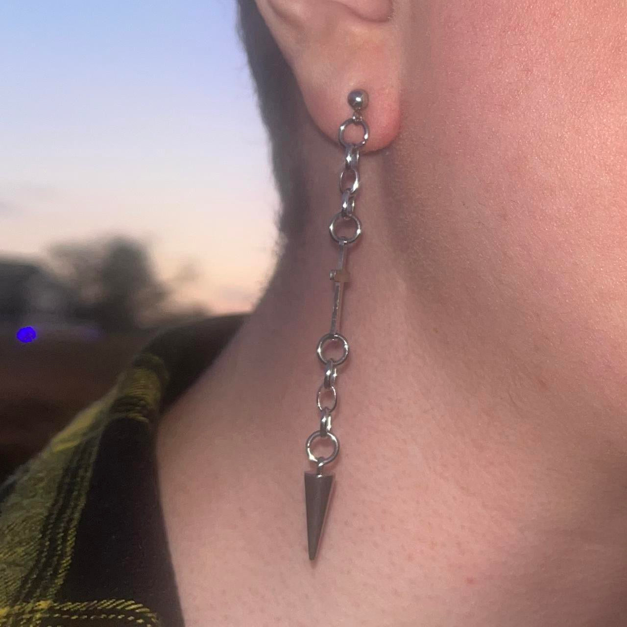 hanging cross and spike earrings