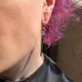 “nihilist” earrings