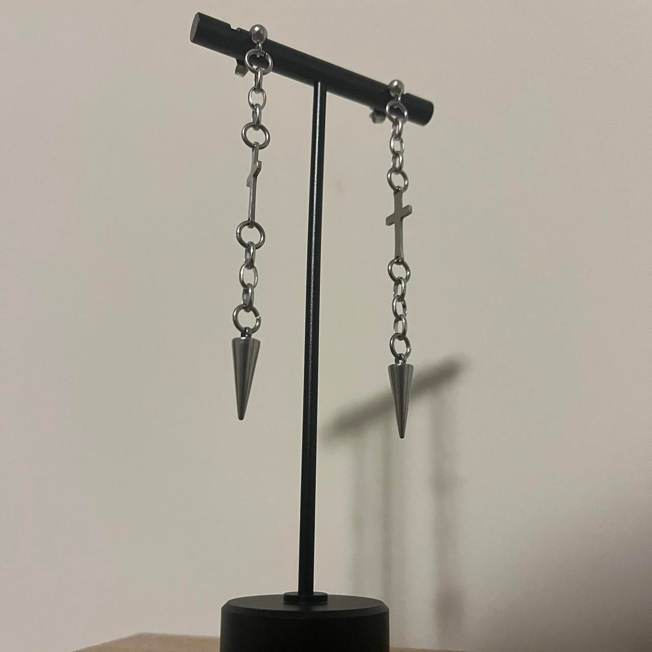 hanging cross and spike earrings
